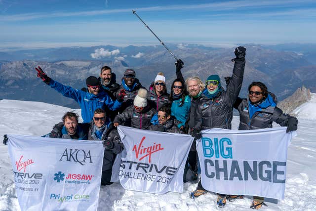 Sir Richard Branson and the core team on the mountain's summit 