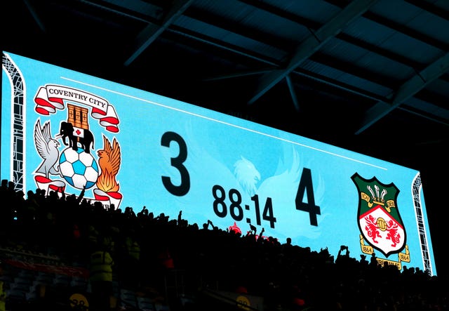 The score is shown on screen towards the end of National League Wrexham's win at Championship Coventry (Barrington Coombs/PA).