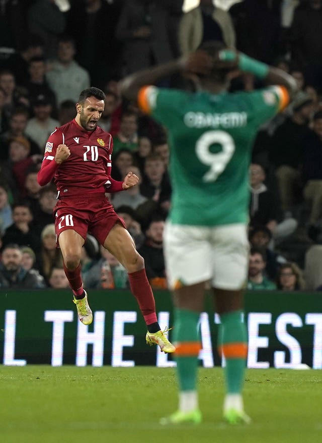 Republic of Ireland striker Michael Obafemi reacts to Artak Dashyan's goal