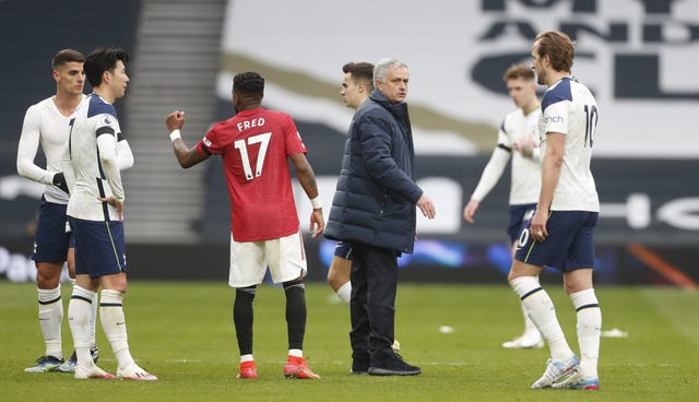 Jose Mourinho (centre) saw his Tottenham team lose to his former club Manchester United on Sunday
