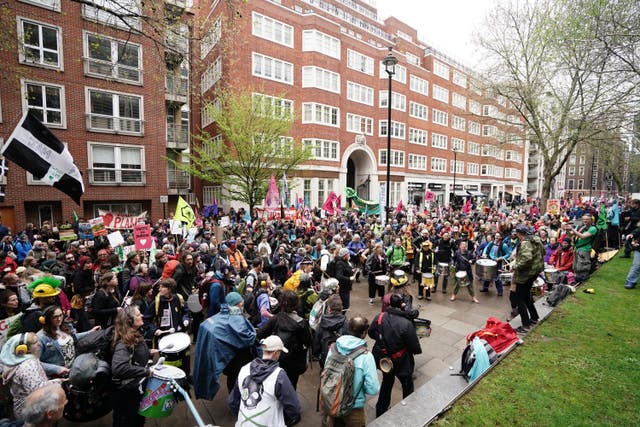 Demonstrators take part in a protest outside the Home Office