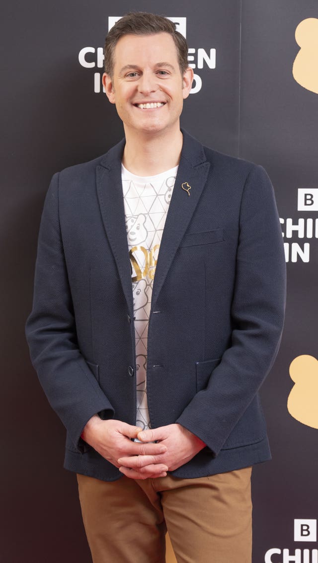 Matt Baker smiling and wearing a Children In Need badge