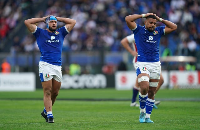 Italy were beaten 33-0 by England in round two
