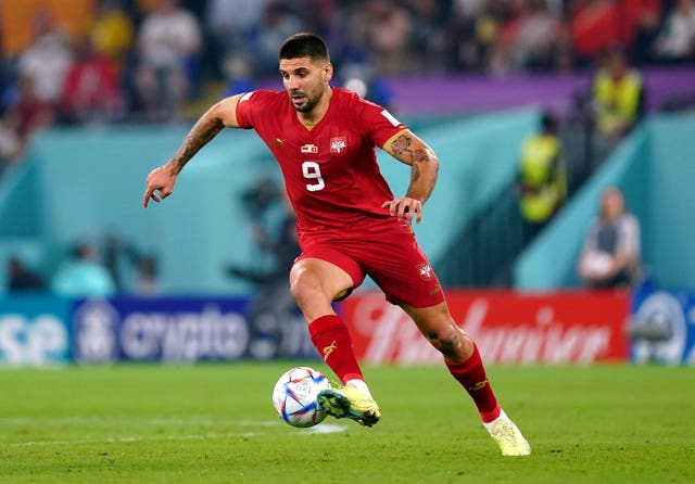 Serbia’s Aleksandar Mitrovic dribbles a football