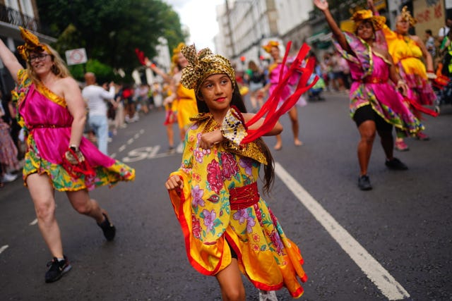 Performers during the children’s parade on Family Day at the Notting Hill Carnival in London 