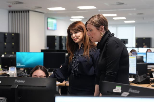 Safeguarding minister Jess Phillips and campaigner Nour Norris at West Midlands Police's control room