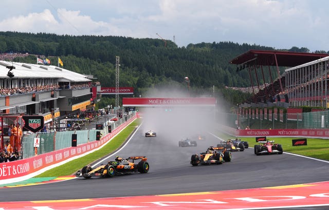 McLaren’s Lando Norris leads the race with team-mate Oscar Piastri behind