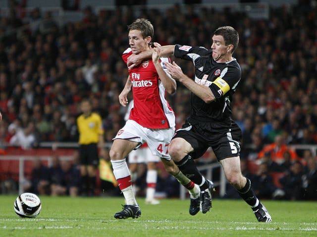 Mark Randall, left, made 13 appearances for Arsenal, including starting a 6-0 League Cup win over Sheffield United in 2008