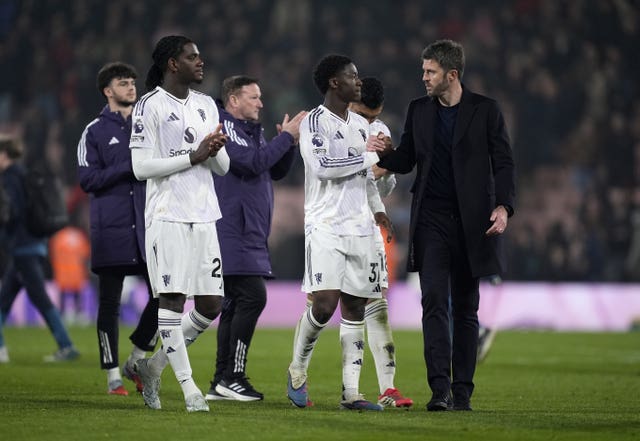 Michael Carrick and Kobbie Mainoo at the final whistle