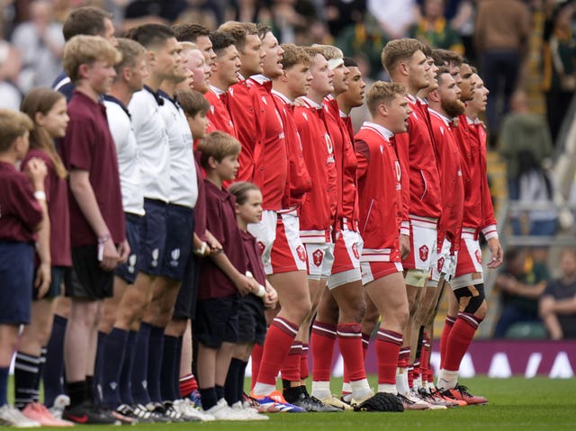 Wales’ players during the national anthem