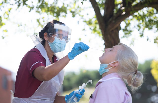 Nurse takes coronavirus swab