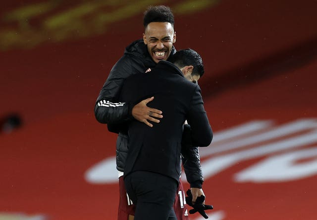 Mikel Arteta, left, and Pierre-Emerick Aubameyang celebrate the win over Manchester United 