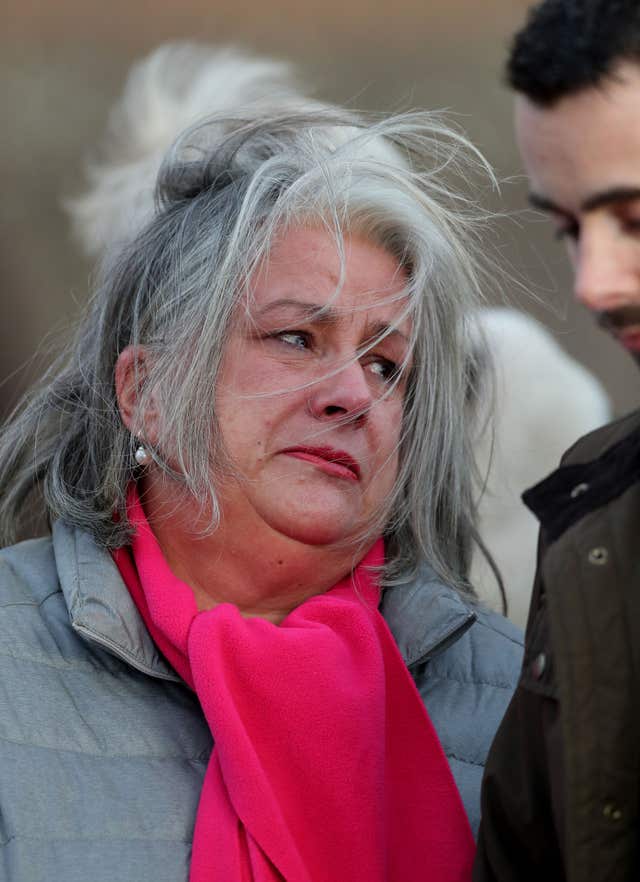 Joanne McLaren, the mother of Molly McLaren, listens as a  statement is read out outside Maidstone Crown Court (Gareth Fuller/PA)