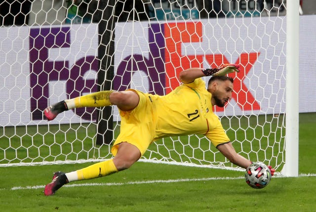 Gianluigi Donnarumma saves from Alvaro Morata, not pictured, during the semi-final shootout against Spain