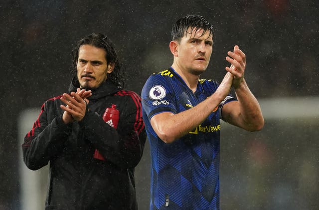 Harry Maguire applauds fans after the 1-1 draw at Burnley