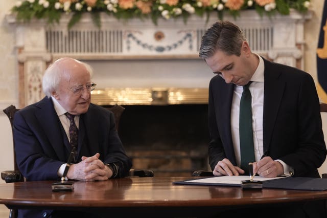 President Michael D Higgins and Taoiseach Simon Harris