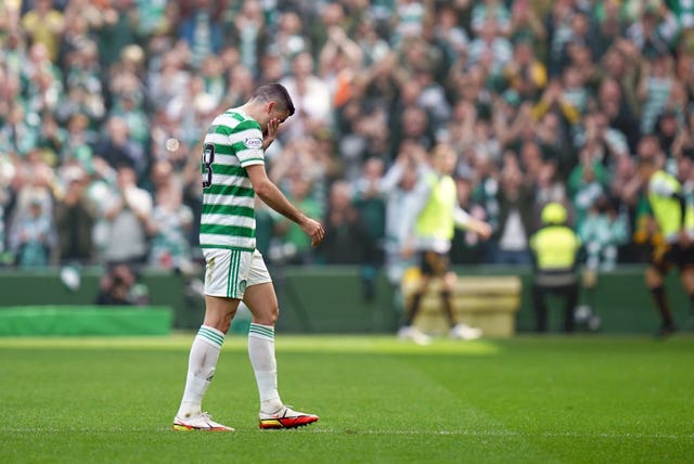 Celtic's Tom Rogic walks off the pitch after being substituted