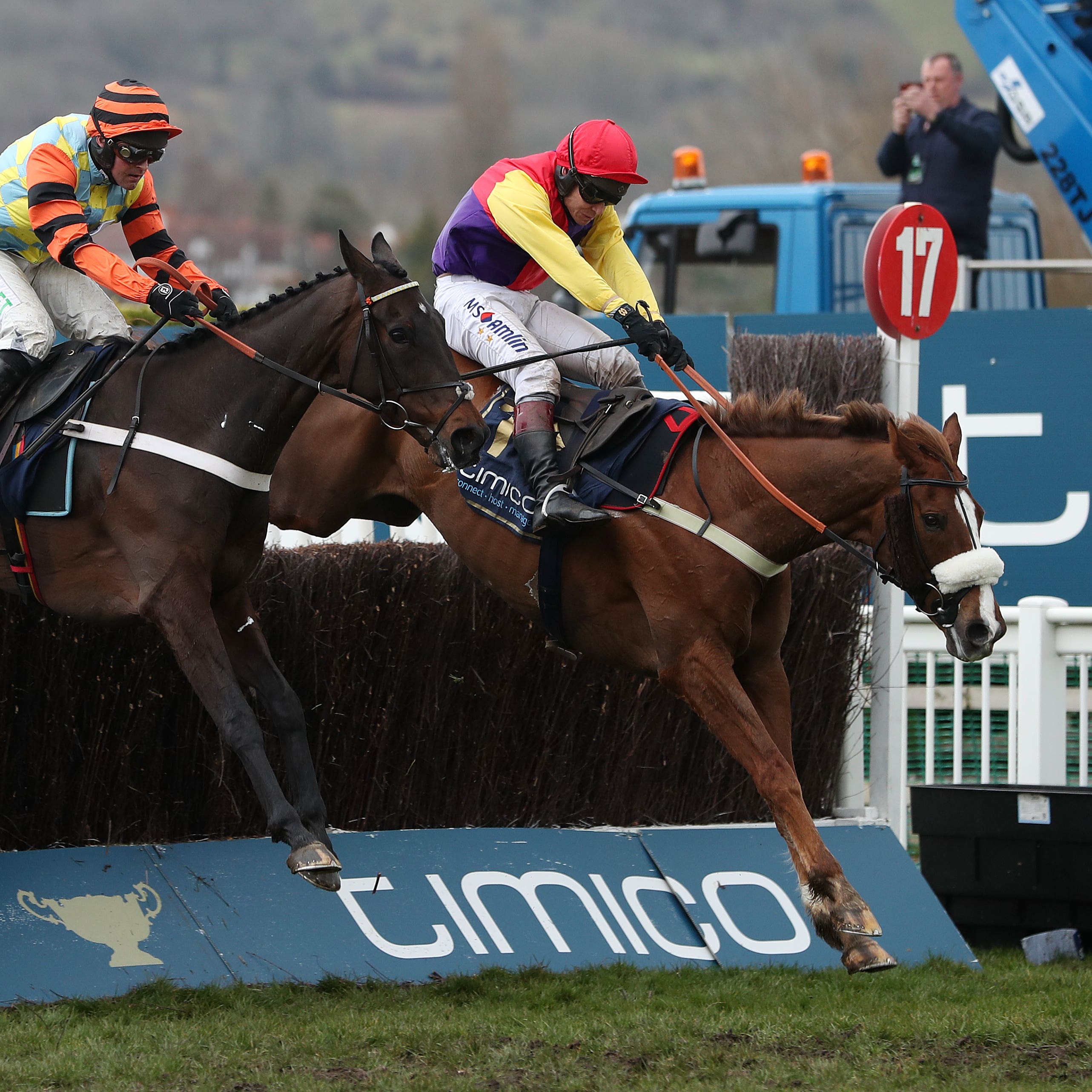 Native River (right) jumps the last ahead of Might Bite to win the Cheltenham Gold Cup