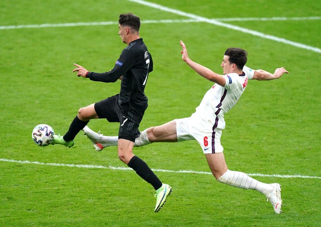 Germany’s Kai Havertz (left) and England’s Harry Maguire battle for the ball