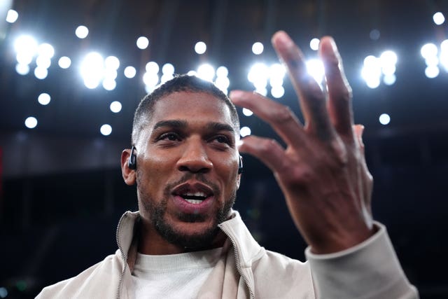 Anthony Joshua reacts following the heavyweight bout between Tyson Fury and Arslanbek Makhmudov