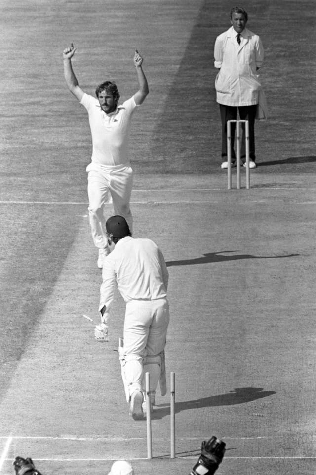 Sir Ian Botham celebrates taking an Ashes wicket