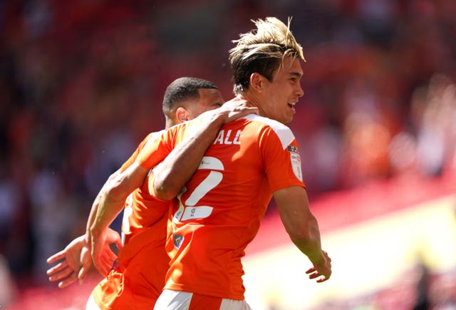Kenny Dougall netted a brace as Blackpool won the League One play-off final on Sunday, beating Lincoln 2-1 (Zac Goodwin/PA).