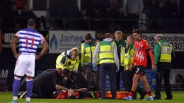 Luton’s Sonny Bradley was carried off on a stretcher (PA)