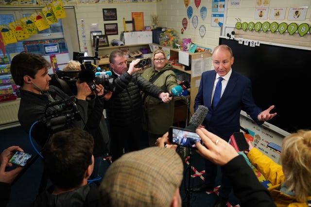 Mr Martin speaking to the media as he casts his vote