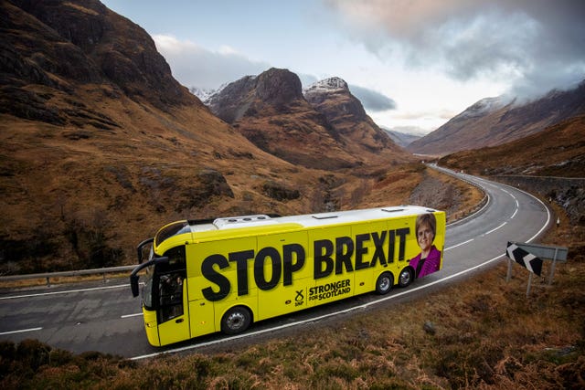 The SNP campaign bus travels up the Pass of Glencoe in the Highlands 