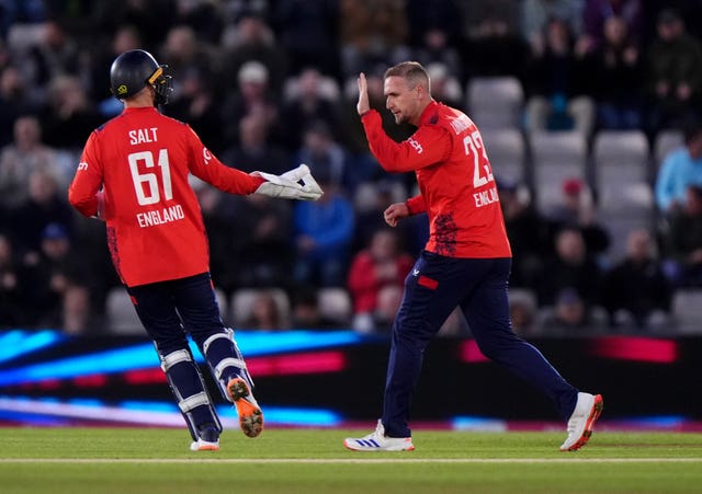 Liam Livingstone, right, celebrates taking a wicket