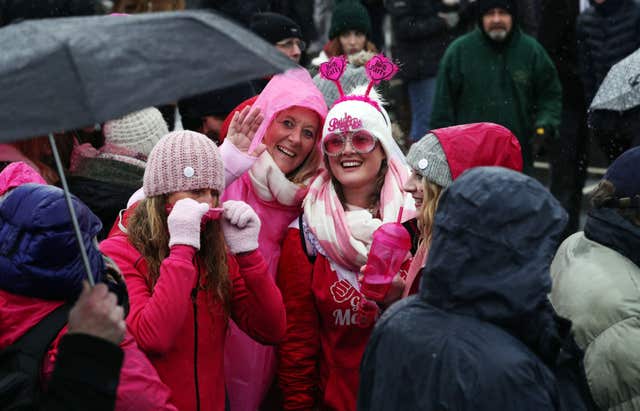 This hen party was among the hundreds who gathered to watch (Aaron Chown/PA)