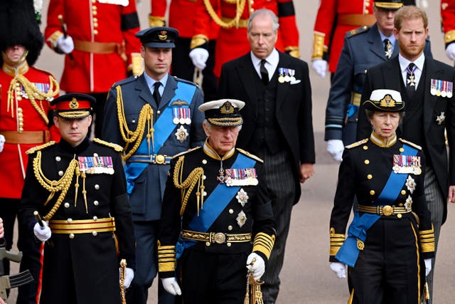 The Prince of Wales, the King and the Princess Royal in their military uniform and the Duke of Sussex in his suit