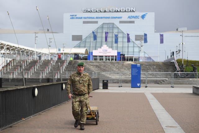 Military personnel at the ExCel centre in London which is being made into a temporary hospital