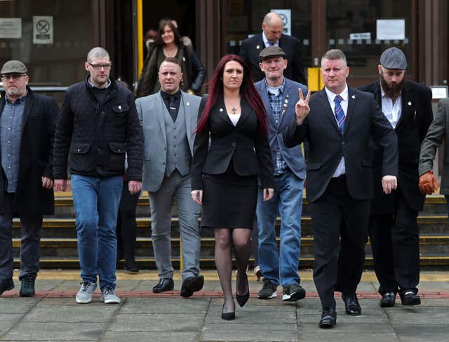 Paul Golding and Jayda Fransen with Britain First supporters (Gareth Fuller/PA)