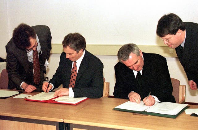 Tony Blair and Bertie Ahern signing the Good Friday peace agreement in 1998