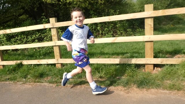 Undated handout photo issued by Katey Edwards of Henry Edwards, 5, who has taken part in the 2.6 Challenge by running 26 miles over 10 days.