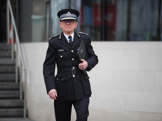 Metropolitan Police Commissioner Sir Mark Rowley outside New Scotland Yard, central London