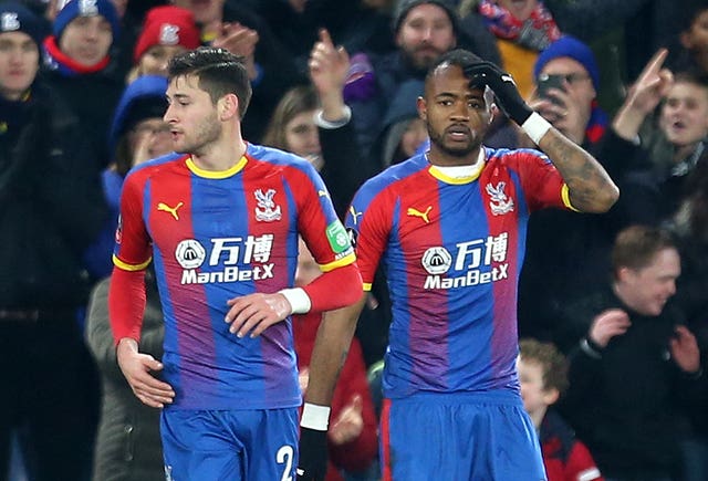 Jordan Ayew, right, reacts after scoring Palace's winner against Grimsby