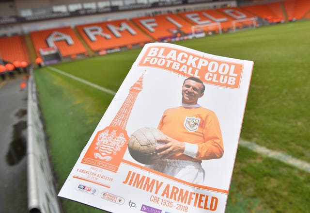 The matchday programme in front of the Armfield stand