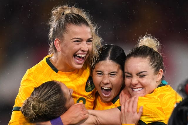 Charlotte Grant (second left) celebrates