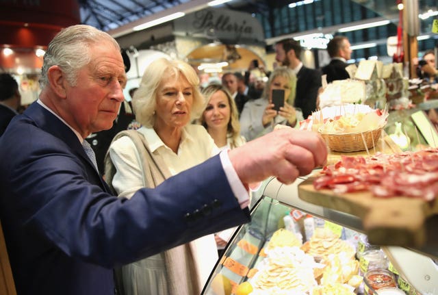 Charles and Camilla sample local produce at the Sant’Ambrogio food market in Florence