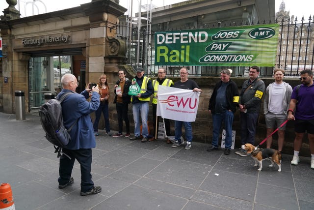 The picket line outside Edinburgh Waverley station, as train services continue to be disrupted following the nationwide strike by members of the Rail, Maritime and Transport union in a bitter dispute over pay, jobs and conditions