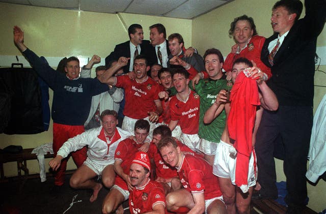 Wrexham celebrate after beating Arsenal