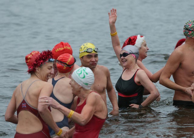 In Pictures Swimmers Brave The Elements For Christmas Day Dip The Irish News