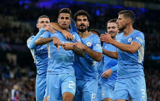 Joao Cancelo, second left, has played a key role for Manchester City this season 