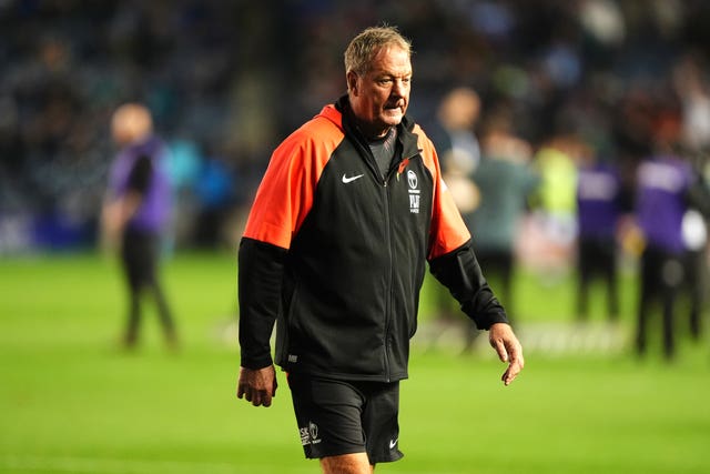 Fiji head coach Mick Byrne walks on the pitch