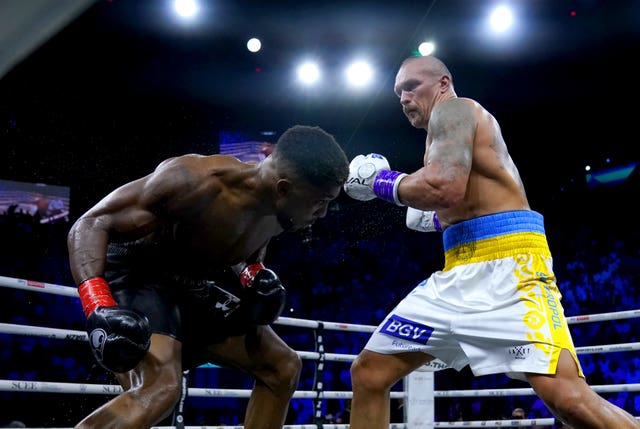 Oleksandr Usyk (right) takes on Anthony Joshua