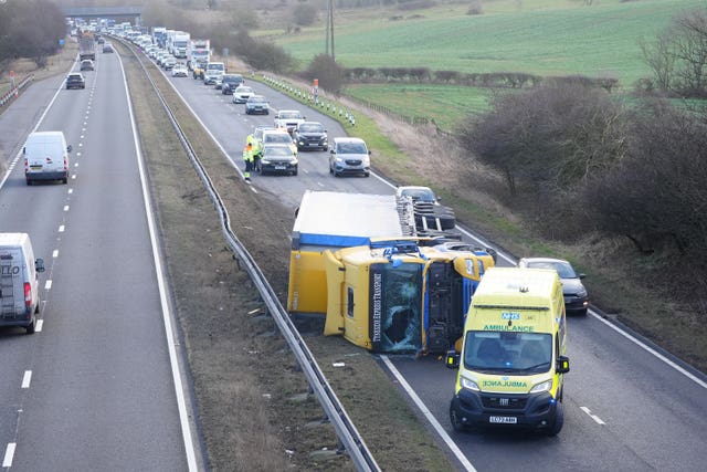 An ambulance attends the scene of a crash during strong winds on the north bound A19 near to the A690 Durham Road, in County Durham