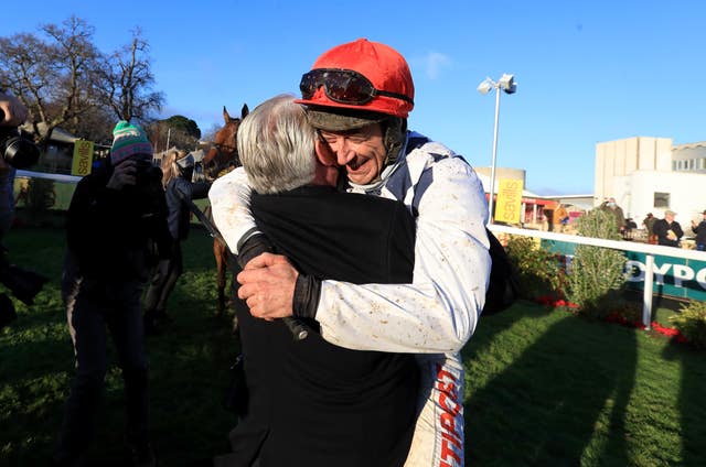 Davy Russell celebrates with owner Ronnie Bartlett after winning the Savills Chase on board Galvin at Leopardstown