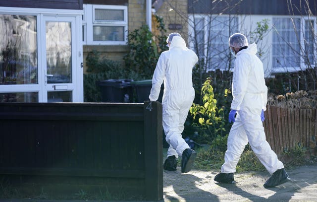 Forensics at the scene in Heath Road, Christchurch, Dorset, where police have launched a murder investigation following the discovery of the body of a man in his 30s on Tuesday evening. Picture date: Wednesday January 5, 2022.